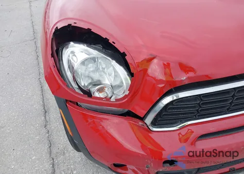 2013 Mini Countryman Cooper S z USA, uszkodzony, nr VIN WMWZC3C51DWP22150